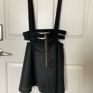 Black suspender skater skirt with zipper and side straps